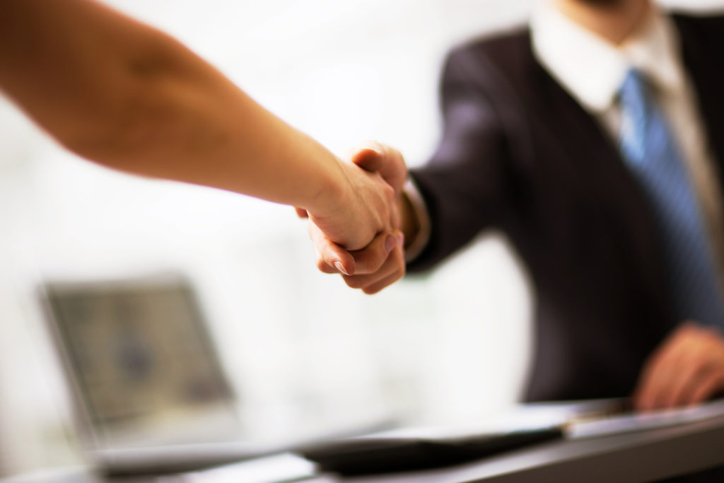 Business people shaking hands